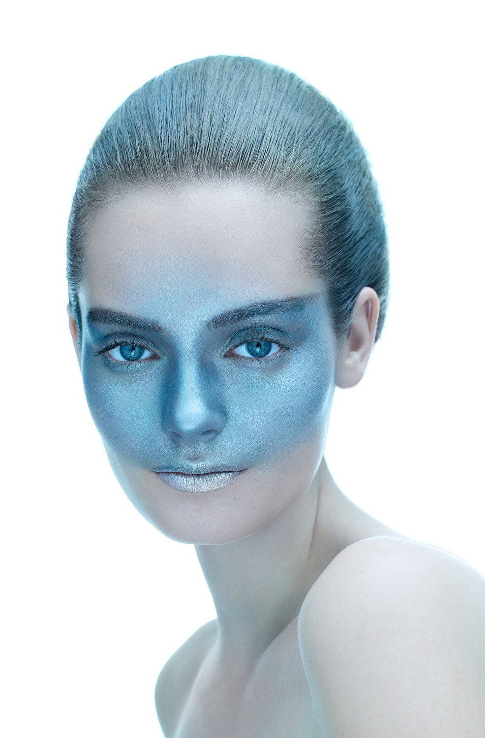 Avant-garde beauty makeup in metallic tones, photographed in New York by Vikram Pathak
