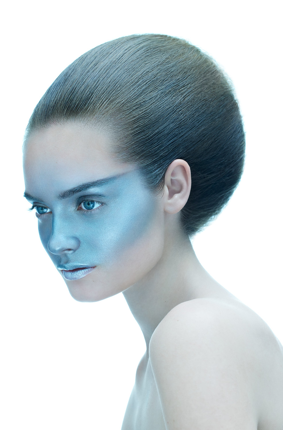 High-fashion beauty model with avant-garde metallic makeup photographed in NY by Vikram Pathak