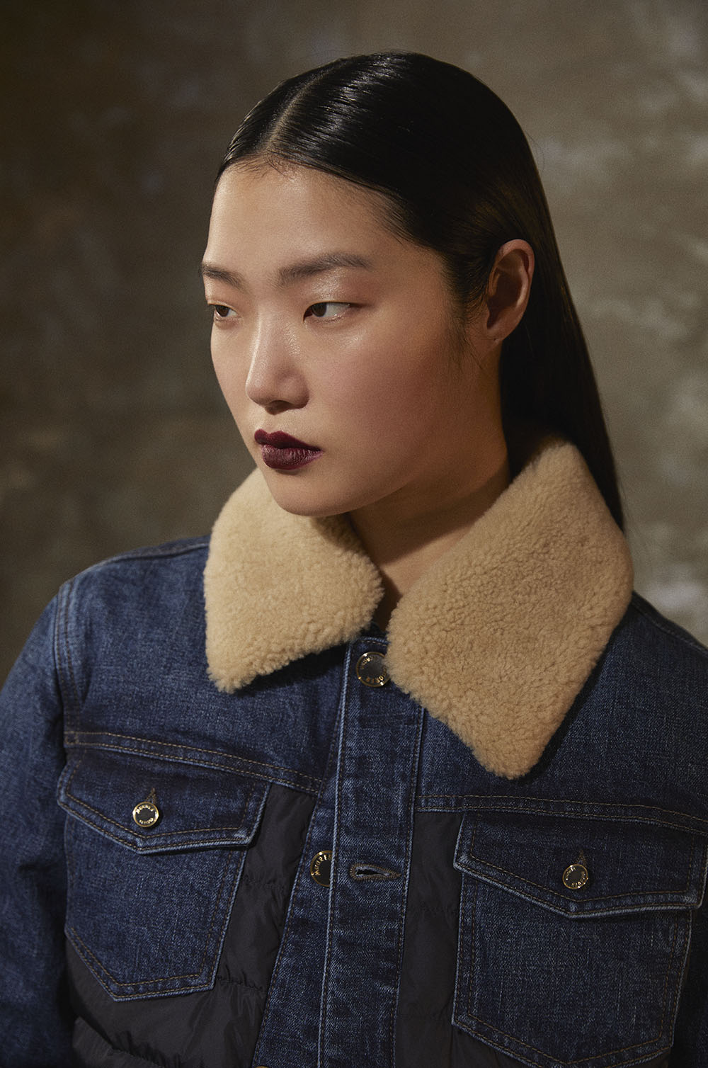 Fashion beauty photographer New York - Close-up of model in denim jacket with shearling collar in studio editorial fashion shoot by Vikram pathak 