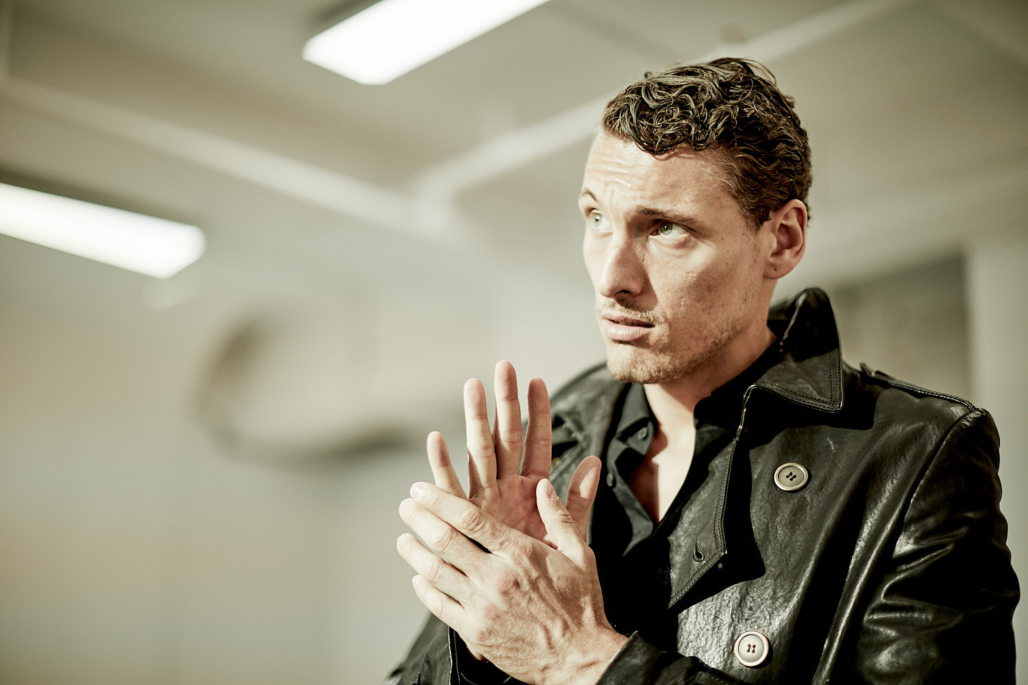 Fashion portrait of male model wearing leather jacket – NYC editorial by Vikram Pathak